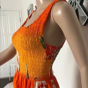 GOGO Orange & Yellow Hawaiian Floral 100% Rayon stretch in top size M used once